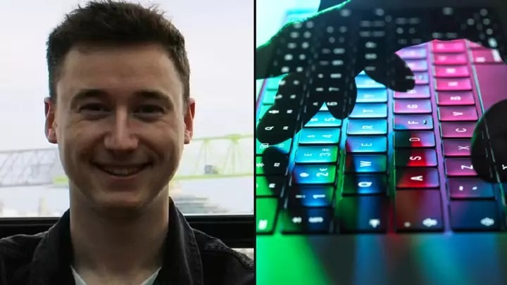 alt=A man smiling while holding a keyboard, radiating joy and contentment.