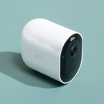 alt=Arlo Pro 4 Spotlight Camera: A high-tech security camera with built-in spotlight for enhanced visibility.
