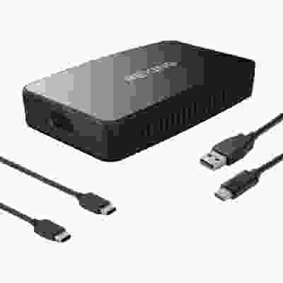 alt=A black external hard drive with a USB cable attached, alongside the Rexing CPW-1 Wireless Apple CarPlay Adapter.