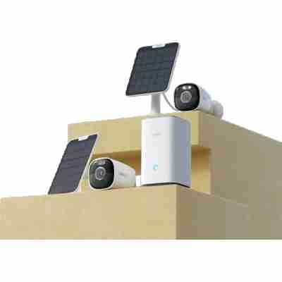 alt=1. Solar powered Reolink security camera and two lights for outdoor surveillance.