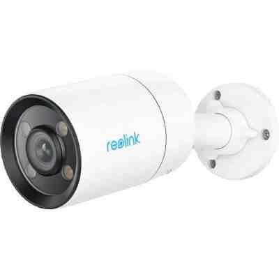 alt=A white Reolink security camera mounted on a wall, featuring a lens with four infrared lights for low-light surveillance.