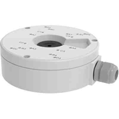 alt=White circular device with labeled indicators on top, featuring a connector on the side, used for electronic or sensor applications.