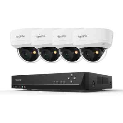 alt=Four Reolink security cameras positioned above a black video recorder, all designed for surveillance and monitoring purposes.