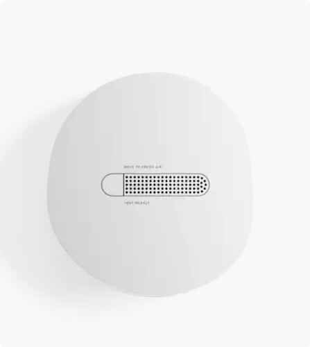 alt=Minimalist round device with a mesh top labeled "MOVE TO FRESH AIR" and "NOT IN USE". The design is simple and modern.